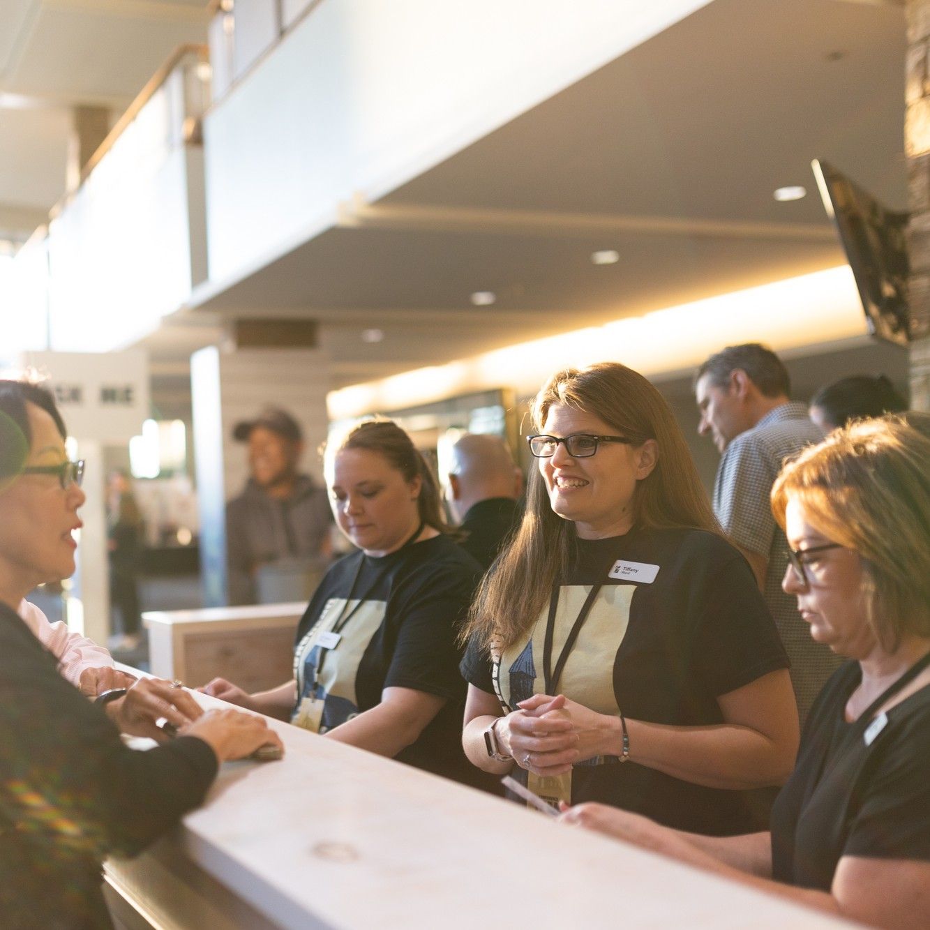 Woman talking at a desk